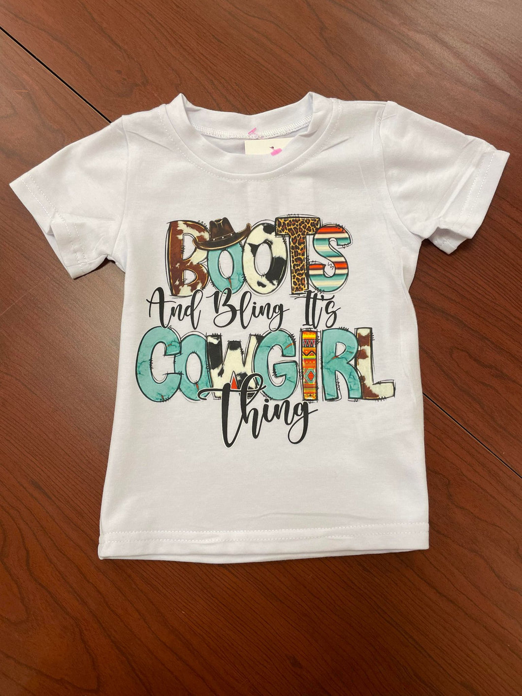 Boots, bling, it's cowgirl things T-shirts